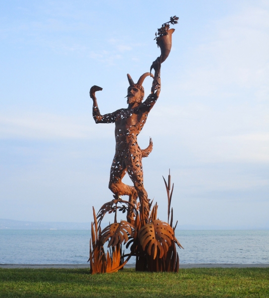 Pan statuette large rusty iron